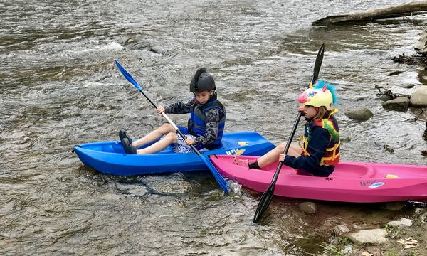Grands trying out their kayaks...
