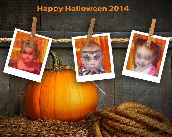 brother and sisters at Halloween...