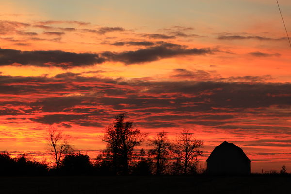 Blazing Indiana sunset with barn...