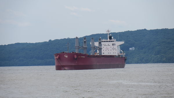 Large cargo ship on the Hudson River headed south ...