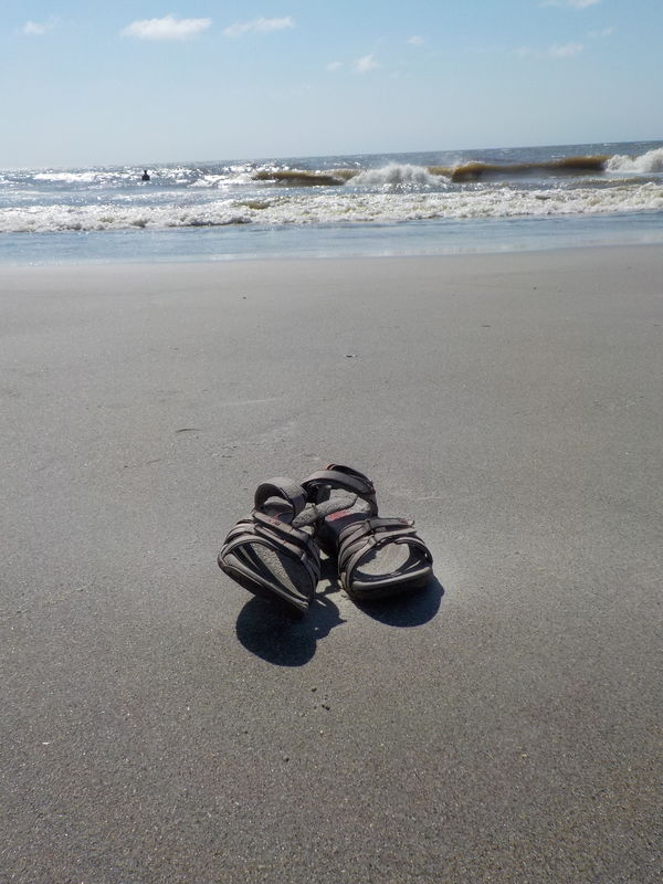 sandals on the shore...