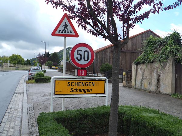 Entering Schengen, staight ahead is Germany, to th...