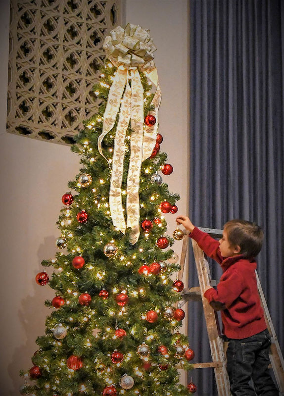 Decorating the Christmas tree at church...