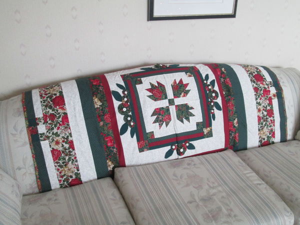 This "Bear Paw" quilt graces the back of the couch...