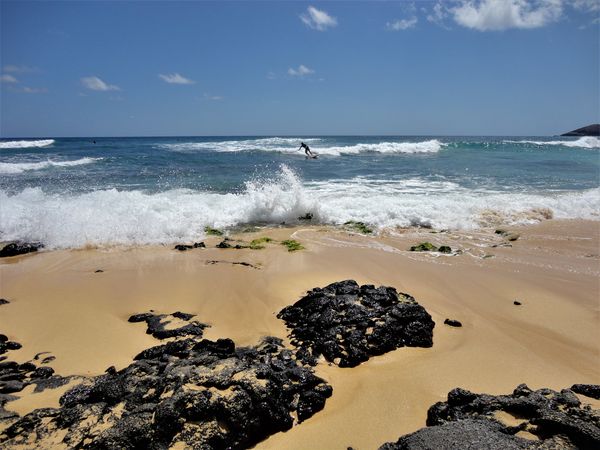 (1) Sandy Beach in the Hawaii Kai area where we li...