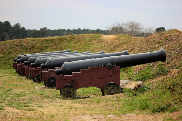 Cannons behind the Colonial earthwork line...