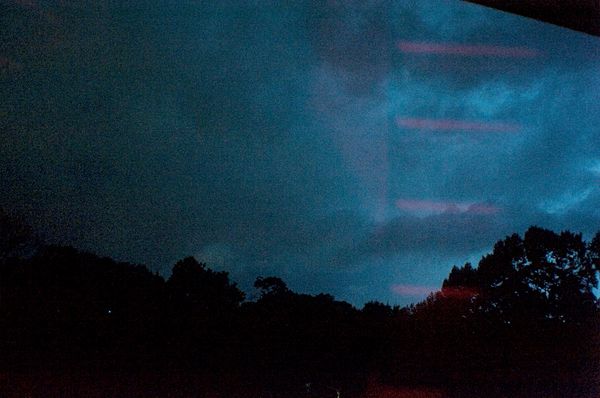 Example of just the clouds lit up and glass reflec...