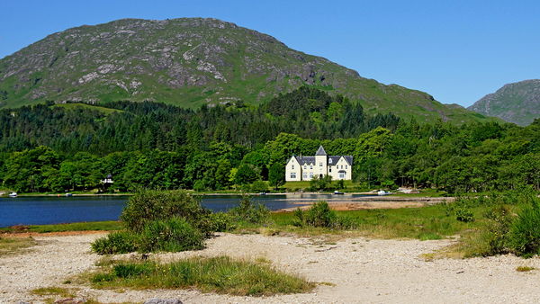 This lovely house with spectacular views of  Loch ...