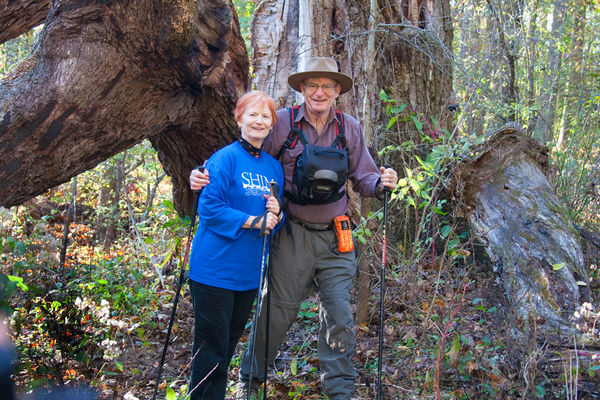 The biggest tree on my trail. My wife and me. A fe...
