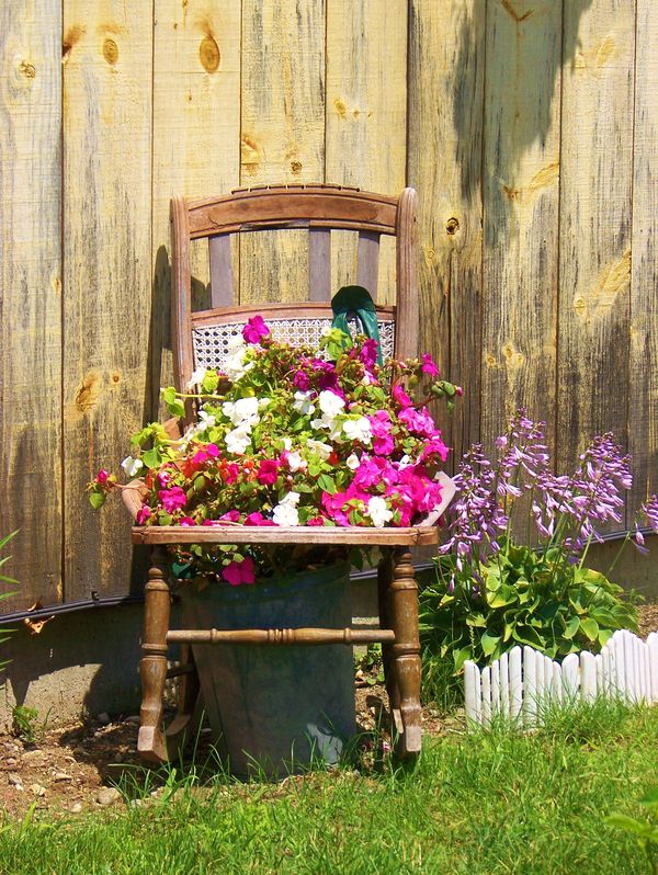 Old Chair getting new life as a planter-found in V...