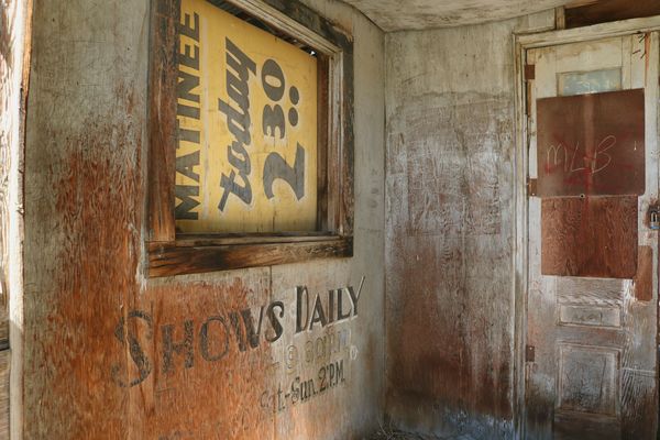 Inside doorway of abandoned theater...