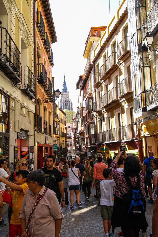 #2  A typically narrow street full of tourists...