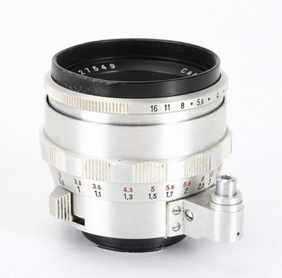 The lever on the lens would return the iris to ful...
