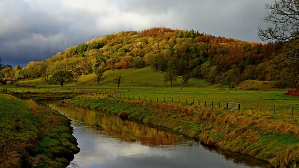 The River  Levens and hill in Greenodd Cumbria...