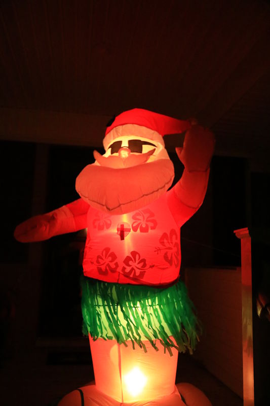 This Hula- Santa, He hula dances on the front porc...