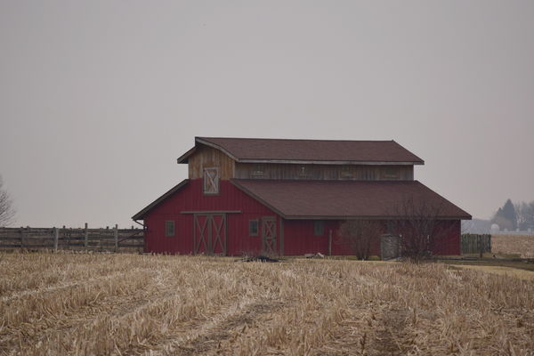 barn standing alone in field...