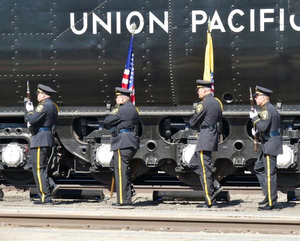 5.  U.P. Honor Guard marching to begin the Nationa...