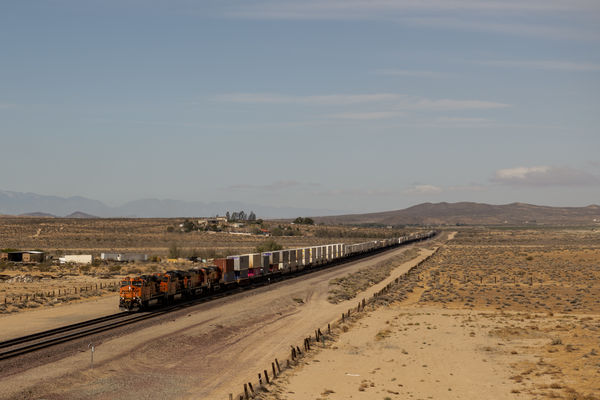 Another train approaches Barstow from the Cajon Pa...