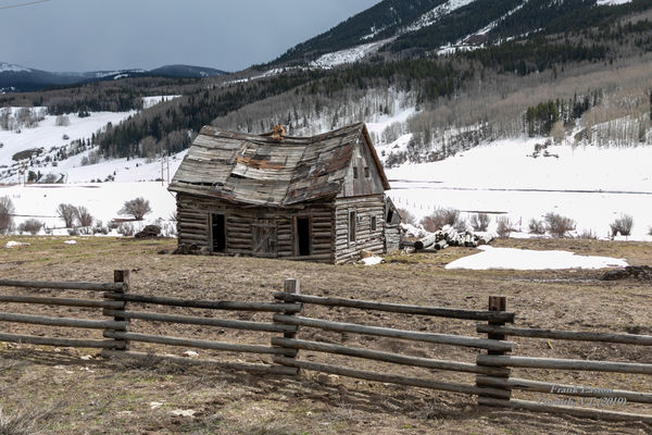 Gunnison, CO, old cabin in front of Whetstone Mtn....