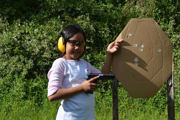 My Daughter and her very first live fire with a .4...