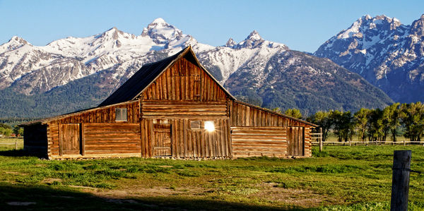 off the window of one of the barns along Mormon Ro...