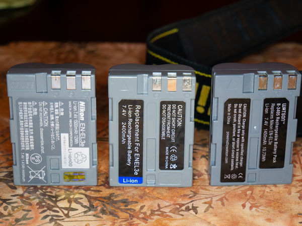 Three Batteries, One Nikon, Two Other...