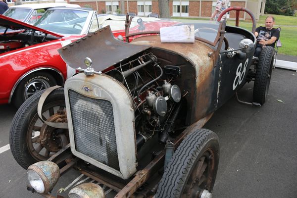 An old Chevy dragster-all parts on or before 1930...