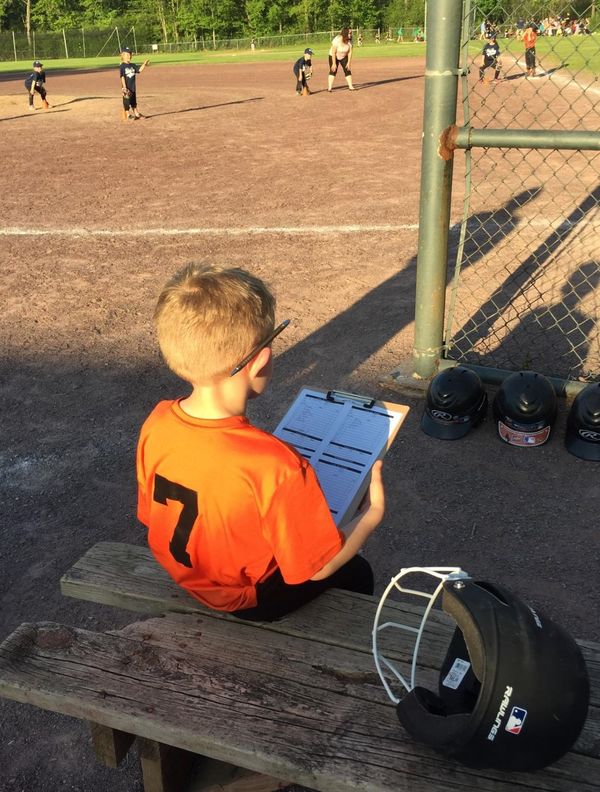 My grandson keeping score at that game...