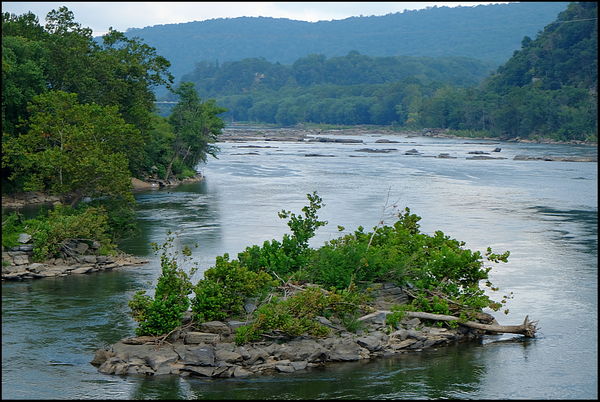 1. A view of one of the 2 rivers that converge at ...