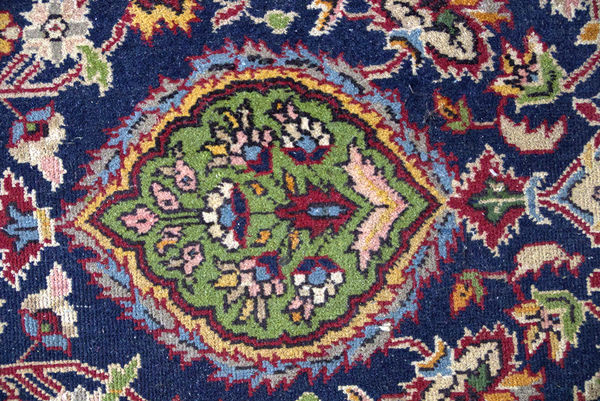 Medallion in the Carpet of a Bedroom...