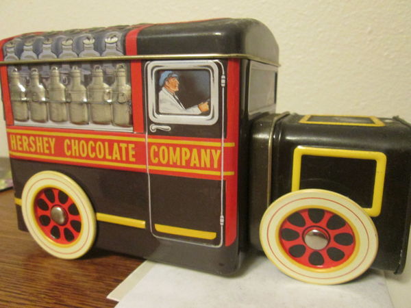 I collect old tins -  "Milk Truck"...