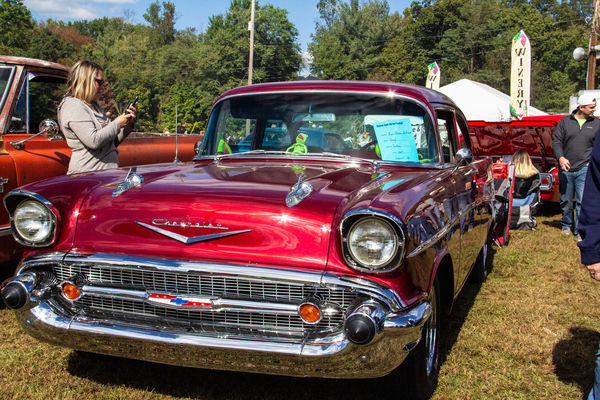 A beautiful red '57 Chevy with Kermit on the dashb...