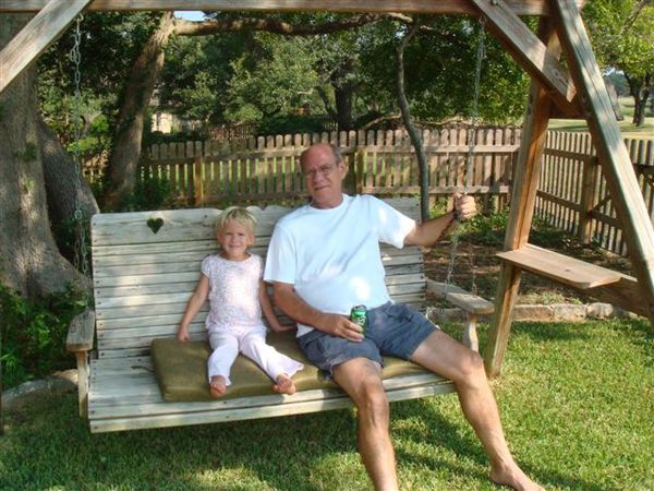 Yard fence.  The young lady in the swing with me i...