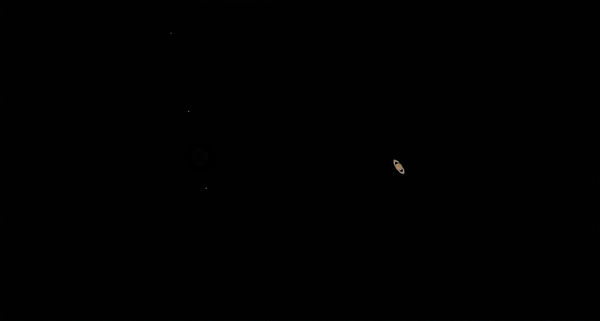 Stacked version of Saturn with Jupiter only left i...