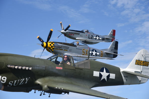P-40 and 2 P-51s...