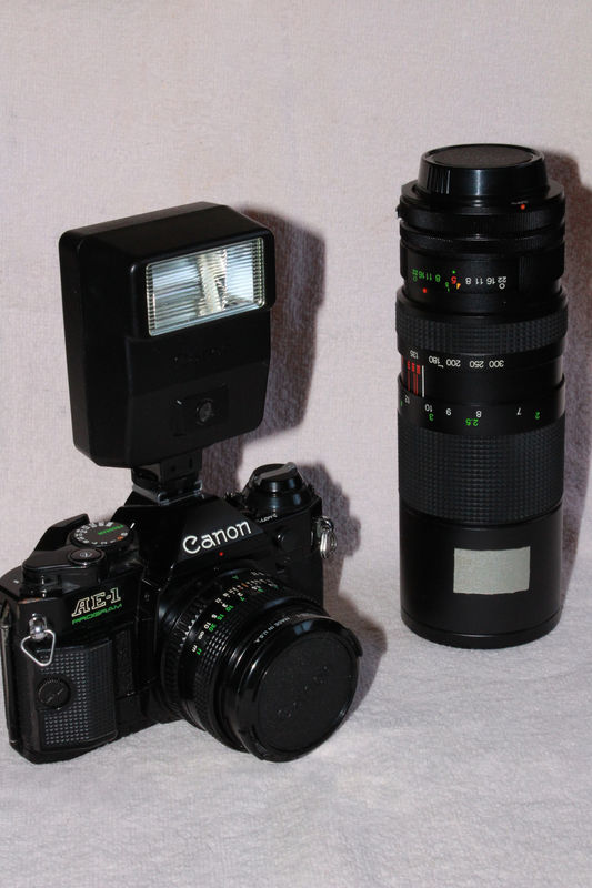 Canon AE-1P and Vivatar 135 to 300 mm lens...