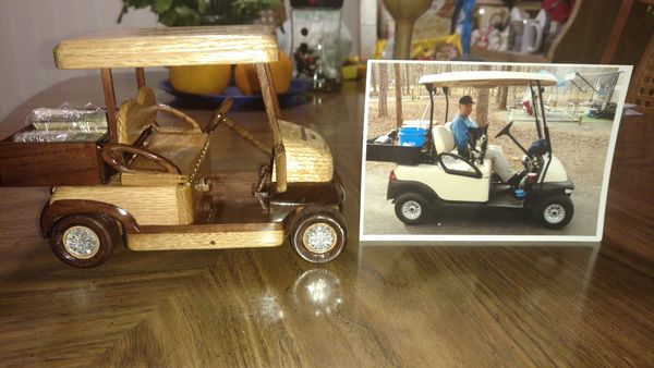 Picture of golf cart with wood model...
