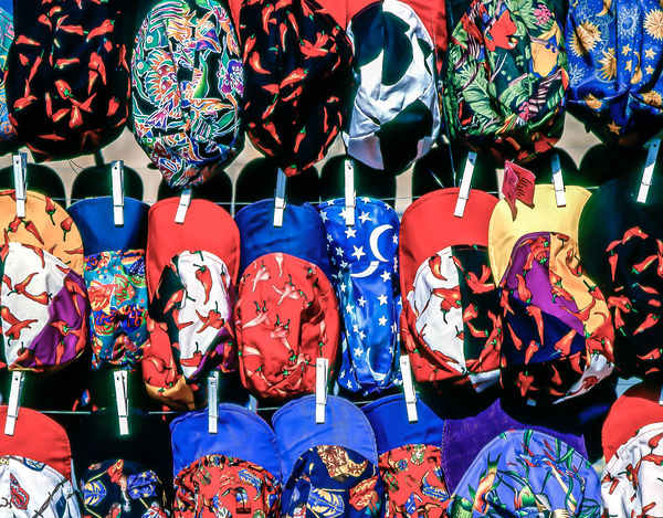 5.  A Vendor Selling Colorful hats in Taos, NM...