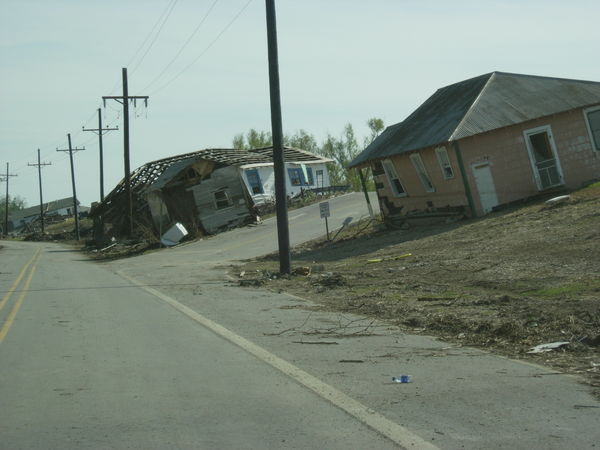 Houses onside of Mississippi River levee...
