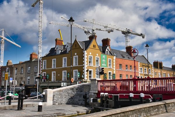 Dublin is a sea of construction cranes amid old ne...
