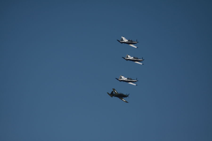 New T-6 Texans flying left to right from the 459th...