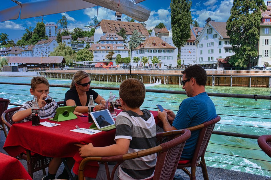 A Swiss family enjoying their devices...