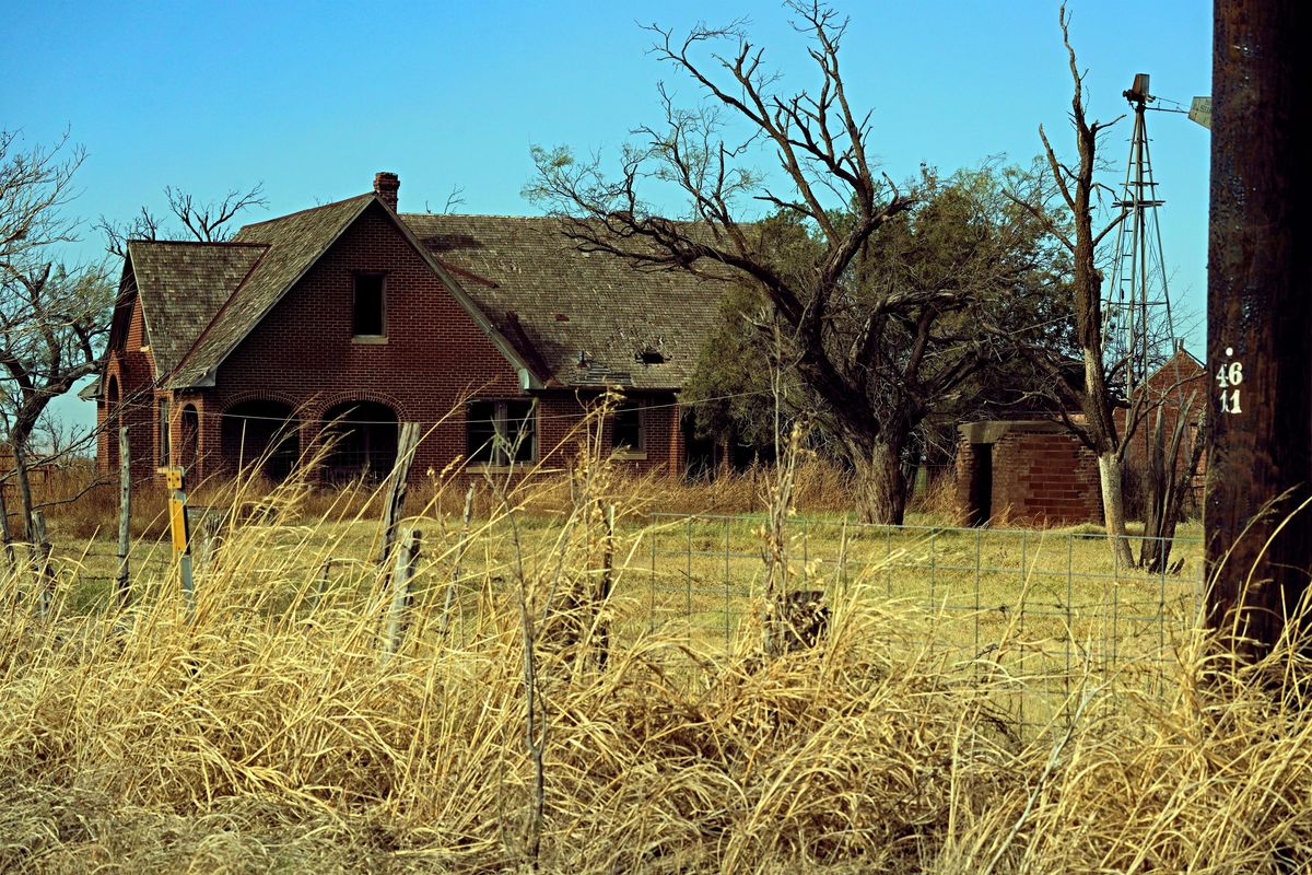 Abandoned brick house south of Seymour Texas on Hw...