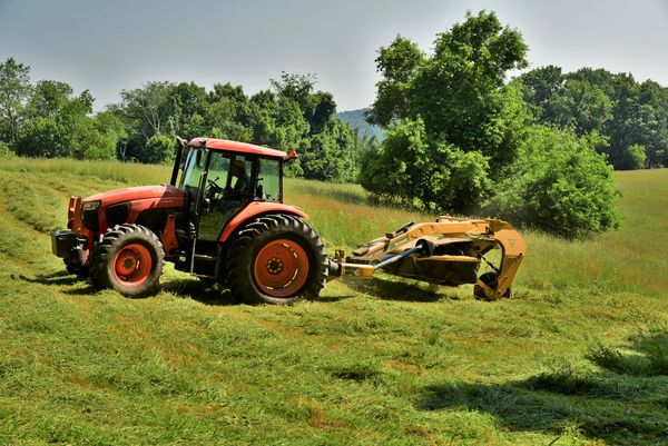 My brother mowing hay...