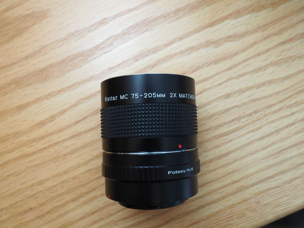 This multiplier will work with Vivitar 75-205mm an...
