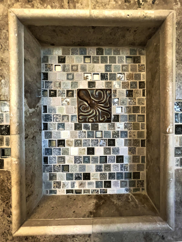 The insets have custom made sea-life tiles in them...