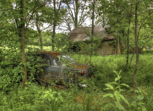 Old car, Old house and weeds....