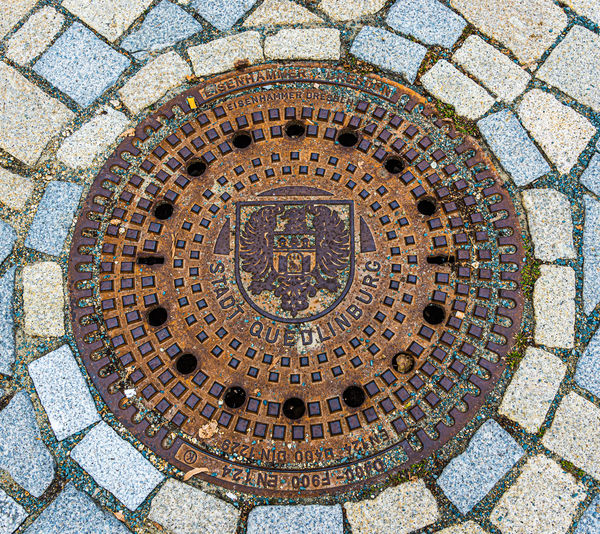 2 - Art in the street: Decorative manhole cover wi...