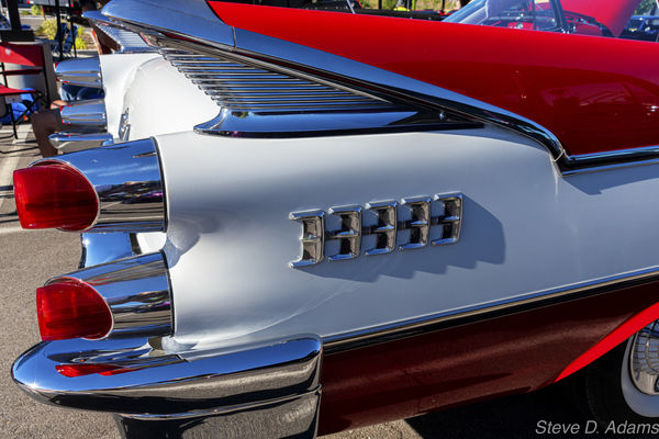 Chrysler with Fins and red rocket lites...