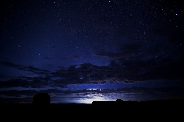 Starry Skies and Lightning at Monument Valley, Ari...